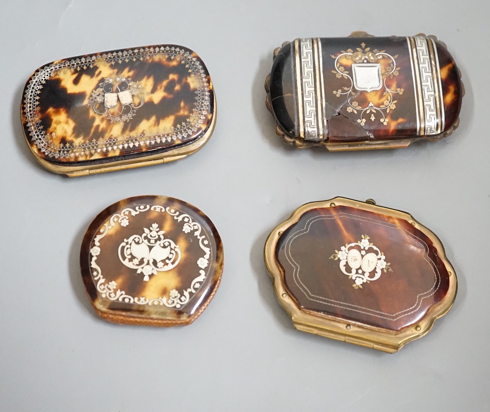 Four 19th century tortoiseshell and piqué work purses